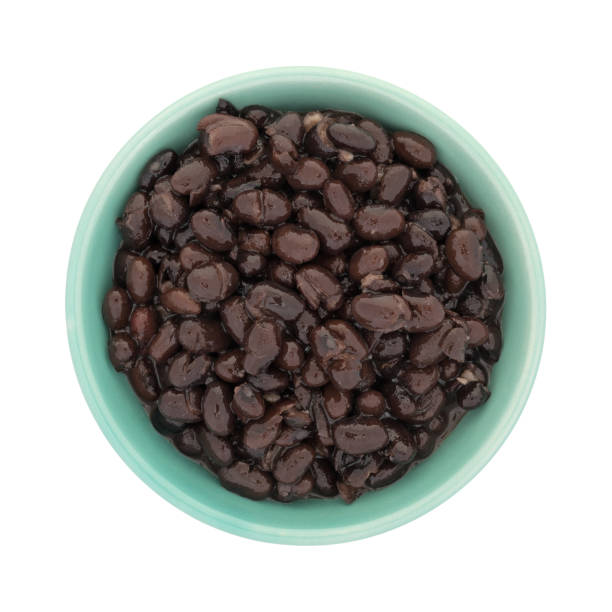istock Organic black beans in a green bowl 828461464