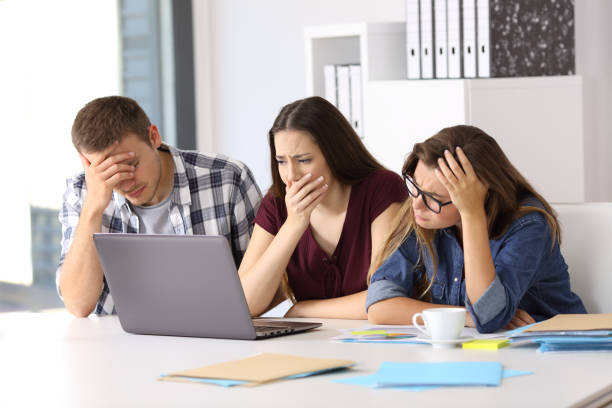 istock Worried business team watching on line content 828463804