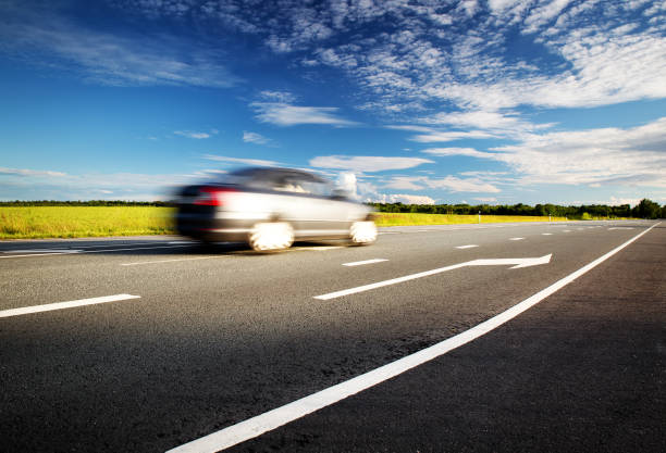 istock Car on asphalt road in beautiful spring day 828464588