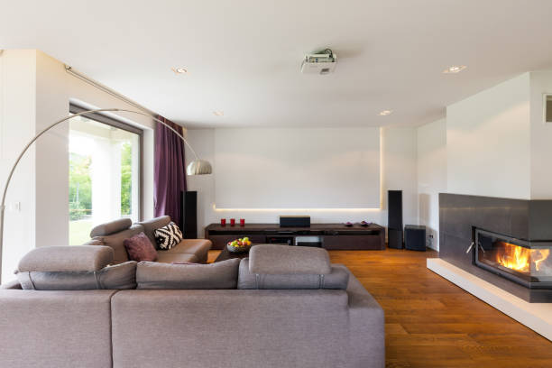 istock Modern living room with fireplace 828465648