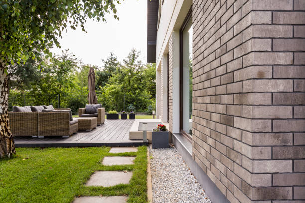 istock House in the suburbs with big patio 828467916