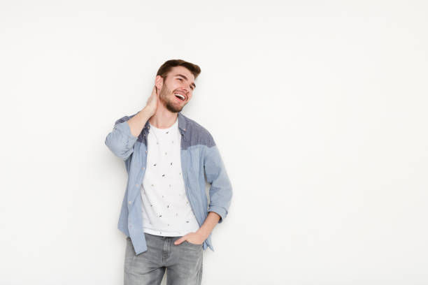 istock Handsome man touching his hair 828469062
