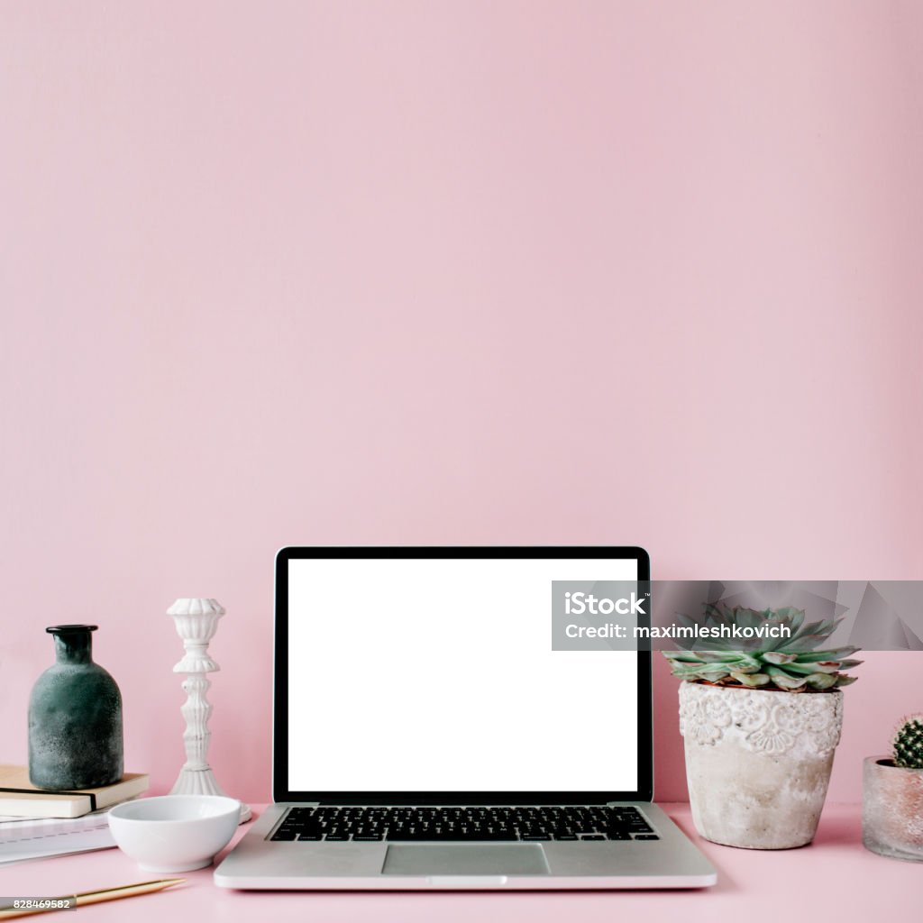 Laptop with blank screen Laptop with blank screen on table with proteus flower and decoration Laptop Stock Photo