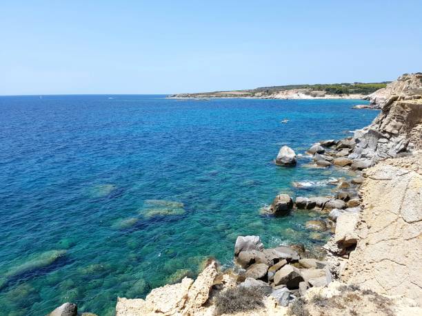 istock rocky coast in Carloforte island 828479094