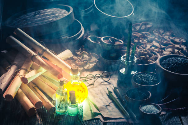 istock Old scrolls and recipe in magical kitchen laboratory 828481210