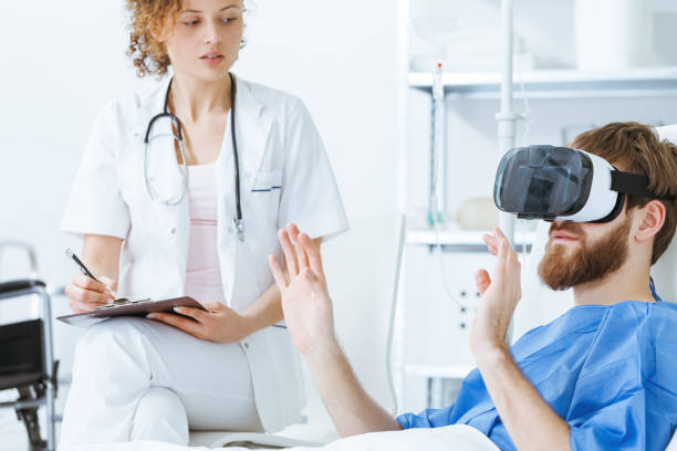 istock Doctor watching patient in VR 828481672
