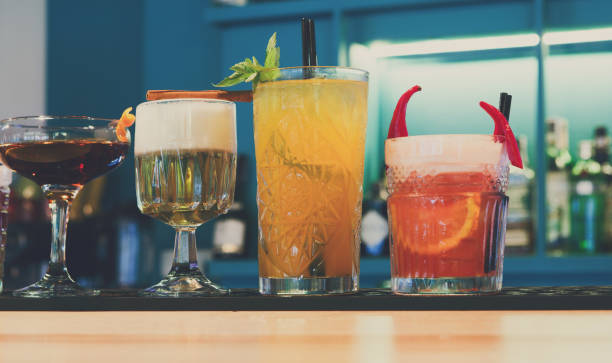 istock Creative alcohol cocktails in night club bar 828484588