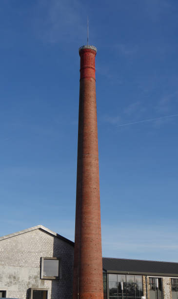 istock Old red brick factory chimney 828485480