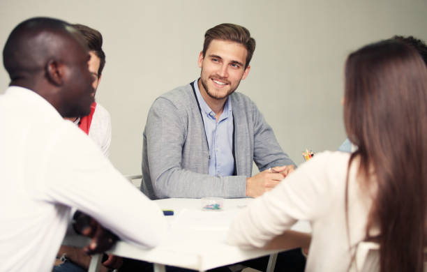 istock Startup Diversity Teamwork Brainstorming Meeting Concept.Business Team Coworker Global Sharing Economy Laptop Graph Screen.People Working Planning Start Up.Group Young Man Women Looking Report Office. 828485680