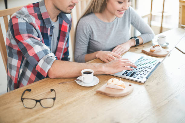 istock Nice looking man and woman in cafe 828498584