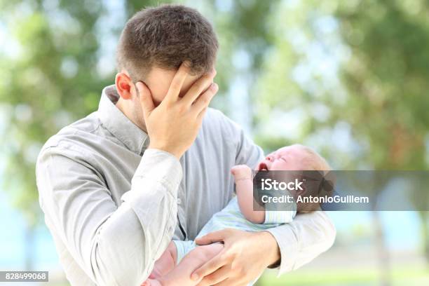 Worried Father And Baby Crying Stock Photo - Download Image Now - Baby - Human Age, Father, Shouting