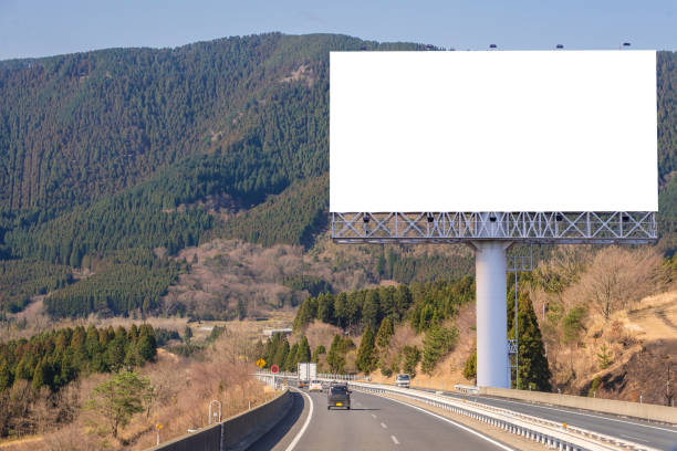 istock billboard blank on countryside road for advertising background 828501784
