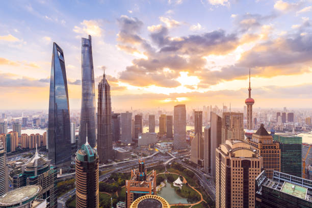 Shanghai skyline and cityscape at sunset stock photo
