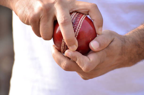 Cricket spin bowler Close-up of cricket spin bowler grip cricket bowler stock pictures, royalty-free photos & images