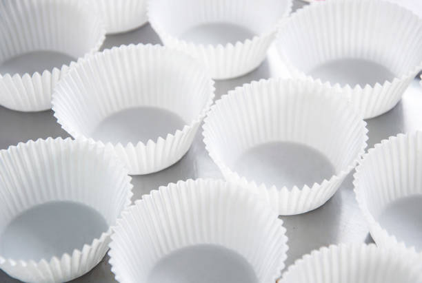 istock Background of white muffin shapes 828504408