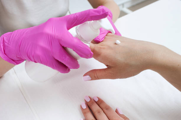 istock Disinfection hands before manicure in the salon 828506606