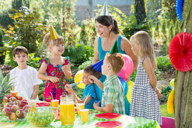 istock Woman playing with kids 828506982