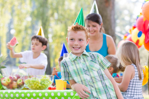 Happy family having fun and celebrating birthday together