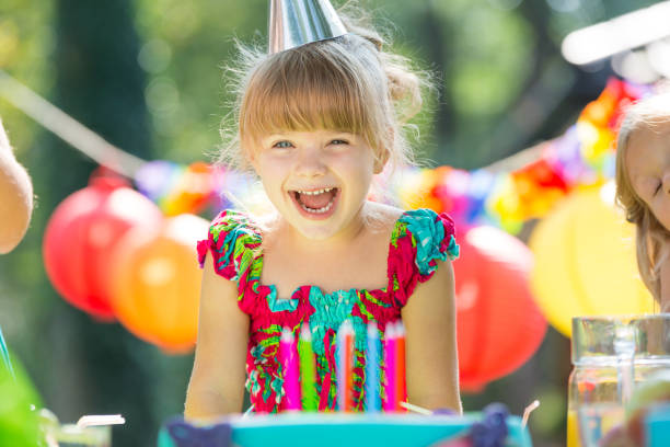 istock Little girl and candles 828507044