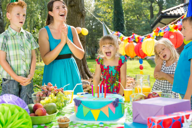 istock Birthday girl and cake 828507046