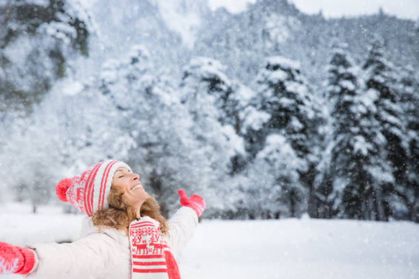 istock Young woman in winter park 828513030