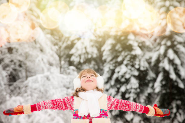 istock Child in winter park 828513320