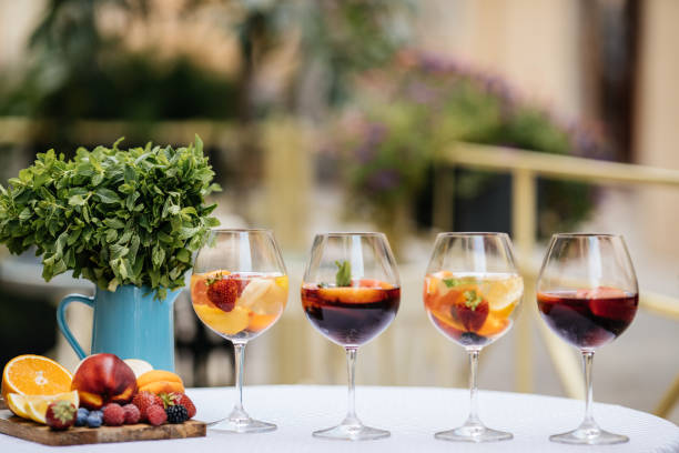 istock Delicious Red Sangria with fruits on table 828513738