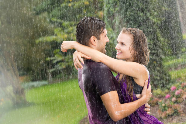 istock Romantic couple in the rain 828513866
