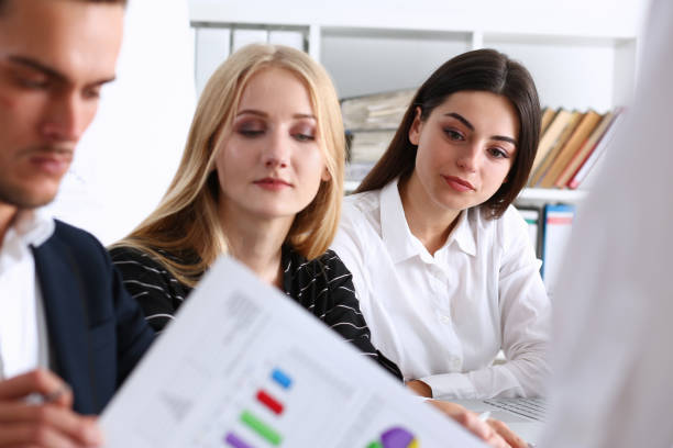 istock Group of people sit in office deliberate on problem 828514648