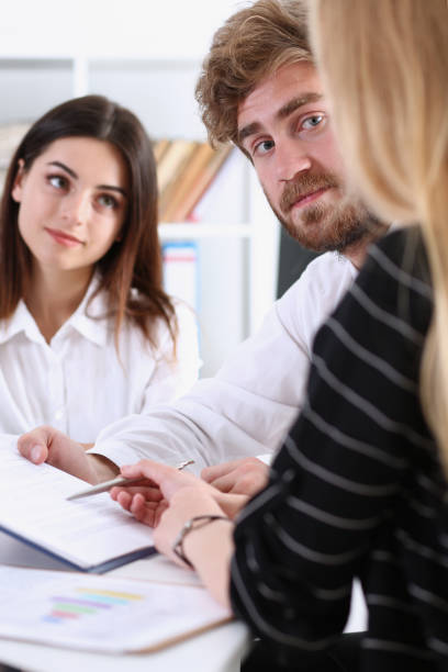 istock Group of people sit in office deliberate on problem 828514784