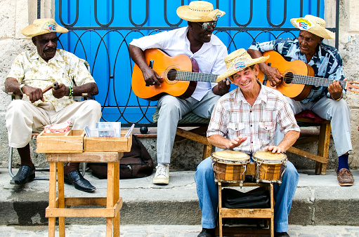HAVANA April 2011 Cuba: very folkloric street musicians at Havana, playing Caribbean music for so many tourists visiting the Plaza de la Catredal