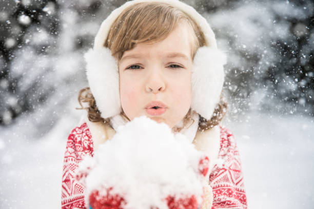 istock Child in winter park 828516068