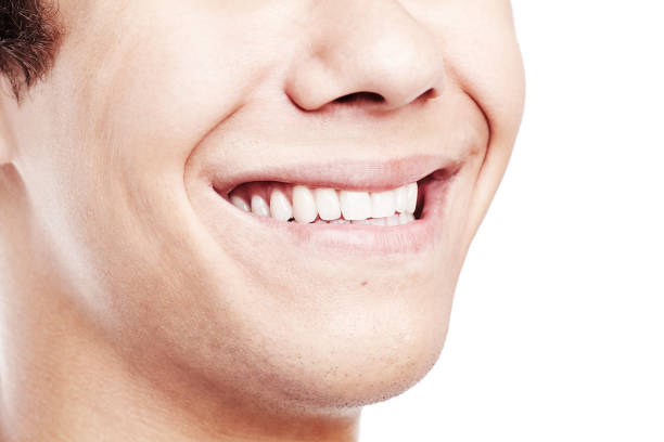 istock Awesome toothy smile closeup 828516196