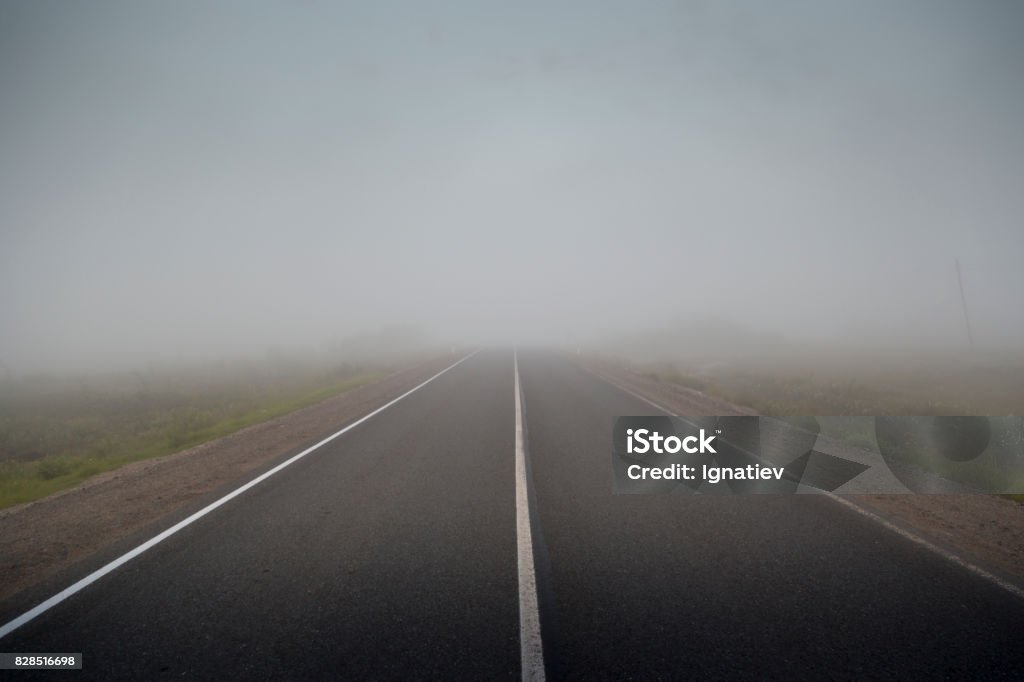 Road in the fog Fog Stock Photo