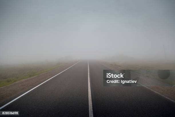 Road In The Fog Stock Photo - Download Image Now - Fog, Road, Spray