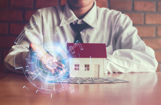 istock Key in hand and new house, Indicative of success and commitment with data technonogy business Concept. 828521876
