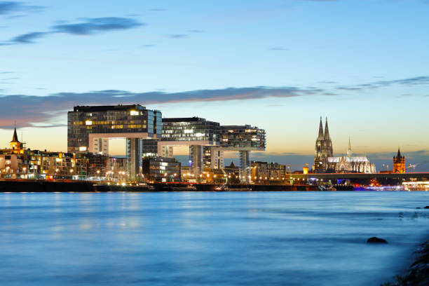 istock Cologne Cathedral and Rheinau Harbor at night 828522494