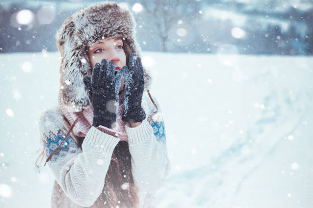 istock Portrait of beautiful girl outdoors while showing 828522726