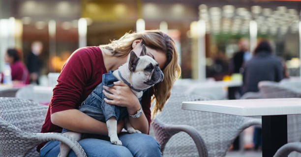 istock Redhead girl with dog 828523350