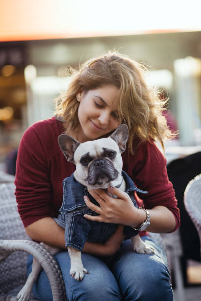 istock Redhead girl with dog 828523424