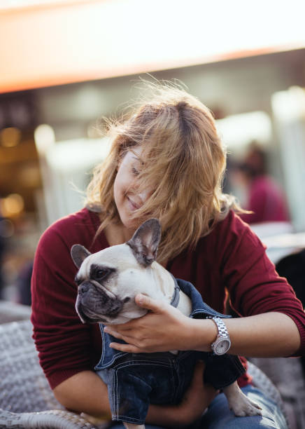 istock Redhead girl with dog 828523642