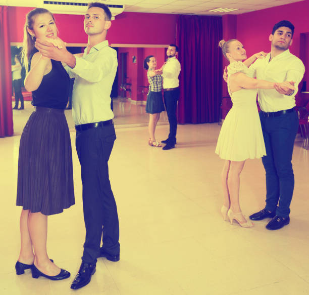 istock People dancing together slow ballroom dances 828524000