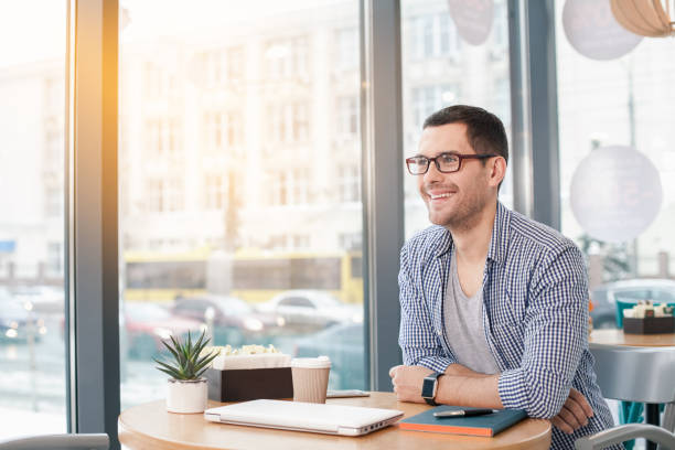 istock Young stylish man in cafe 828527570