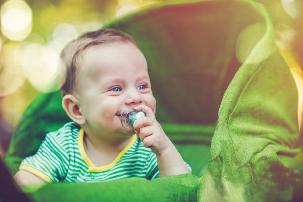 Cheerful Baby Boy Smiling To His Mom