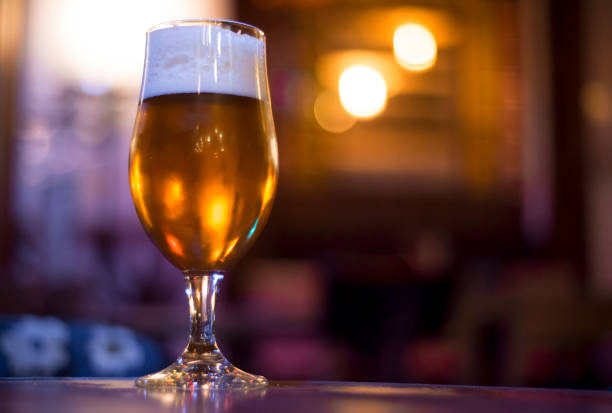 istock Glass with beer in the bar 828530314