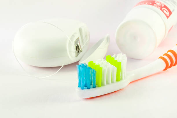 istock Daily oral hygiene - toothbrush, toothpaste and dental floss 828530432