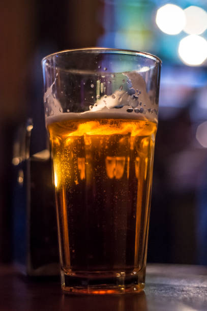 istock Glass with beer in the bar 828530698
