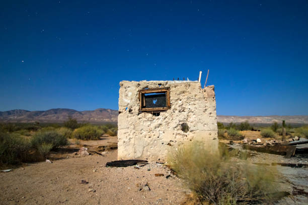 istock Desert landscape Mojave Desert abandoned building at night 828538148