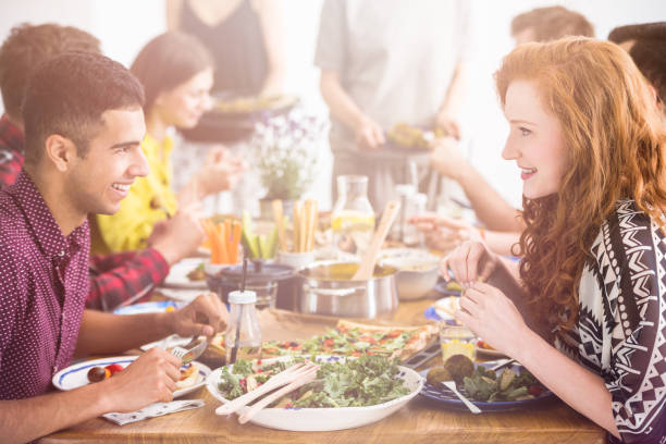 istock Handsome man enjoys vegetarian meal 828545734