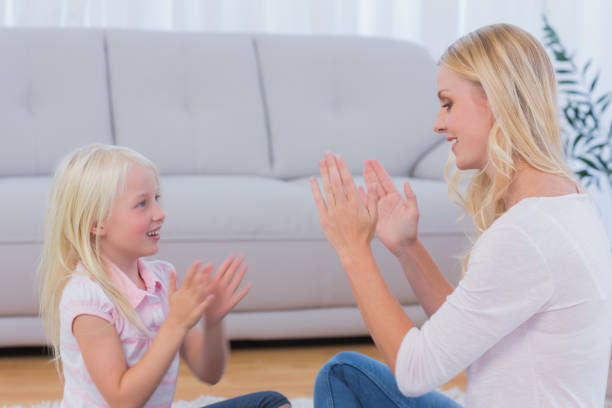 istock Mother and daughter playing together 828550806